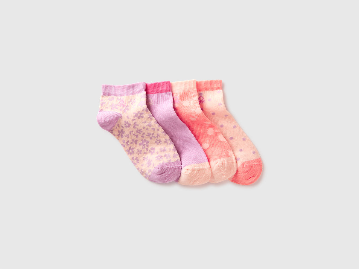 Four patterned short socks