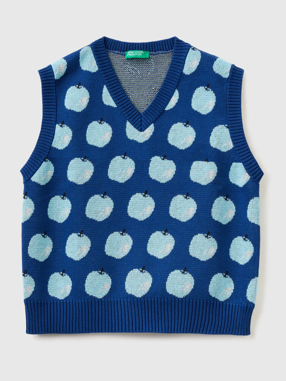 Blue vest with apple pattern