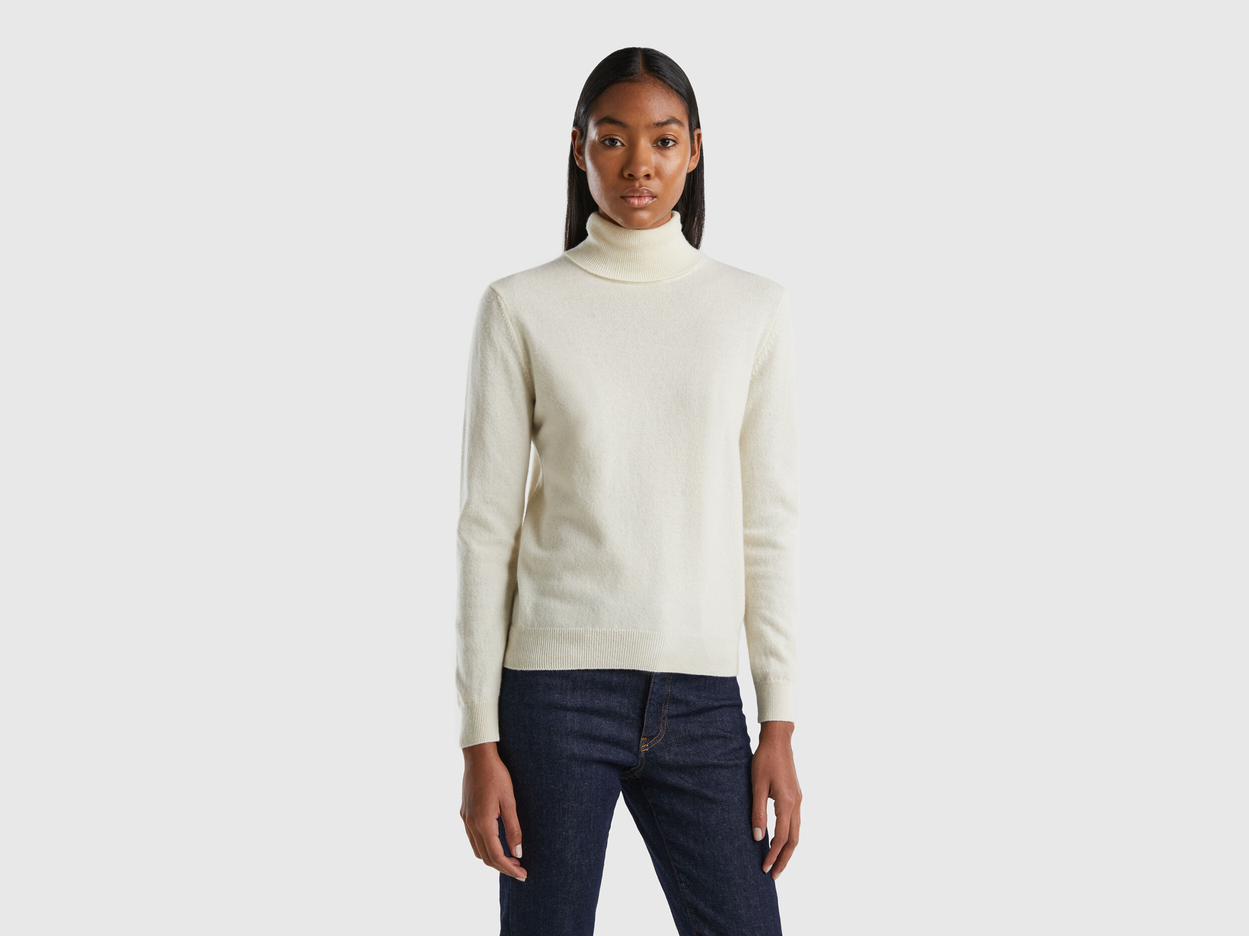 Cream turtleneck sweater in pure Merino wool