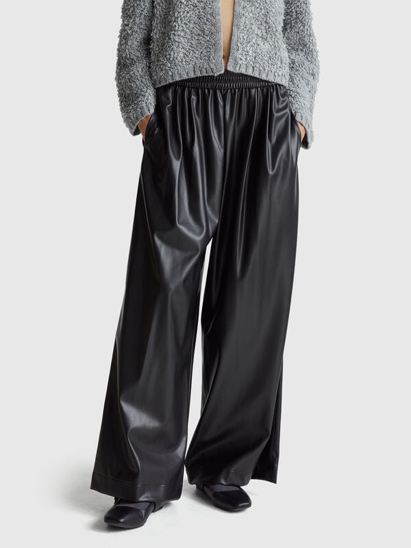 Trousers in imitation leather fabric Women