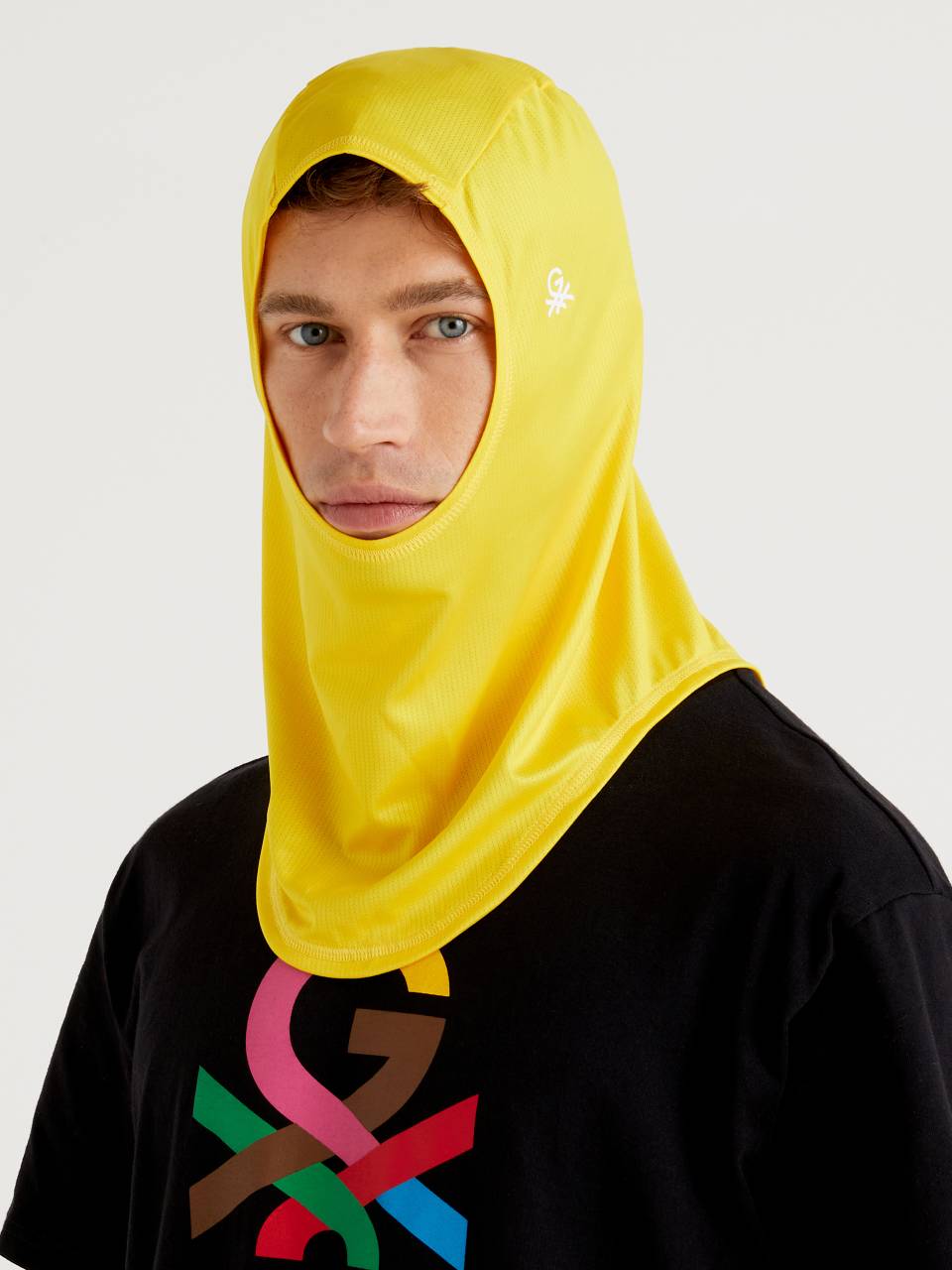 Benetton Unisex yellow hijab with logo by Ghali. 1